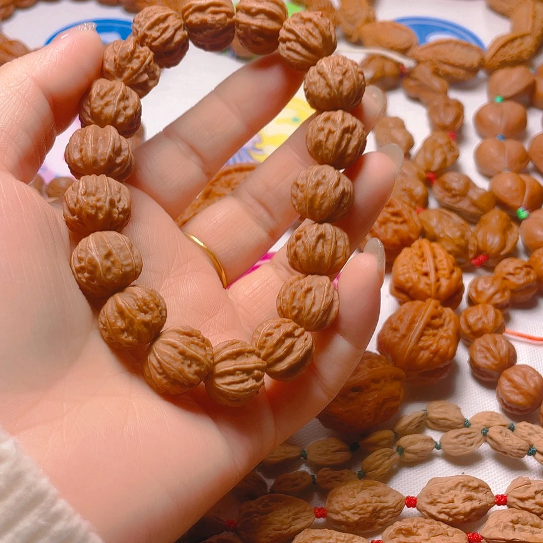 自***行文玩核桃吊坠京八棱