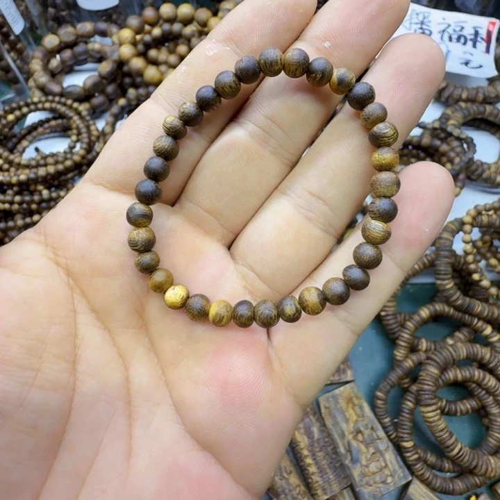 沉香沉香碎屑奇楠沉香乌身卡0.5单圈虫漏珠2克+