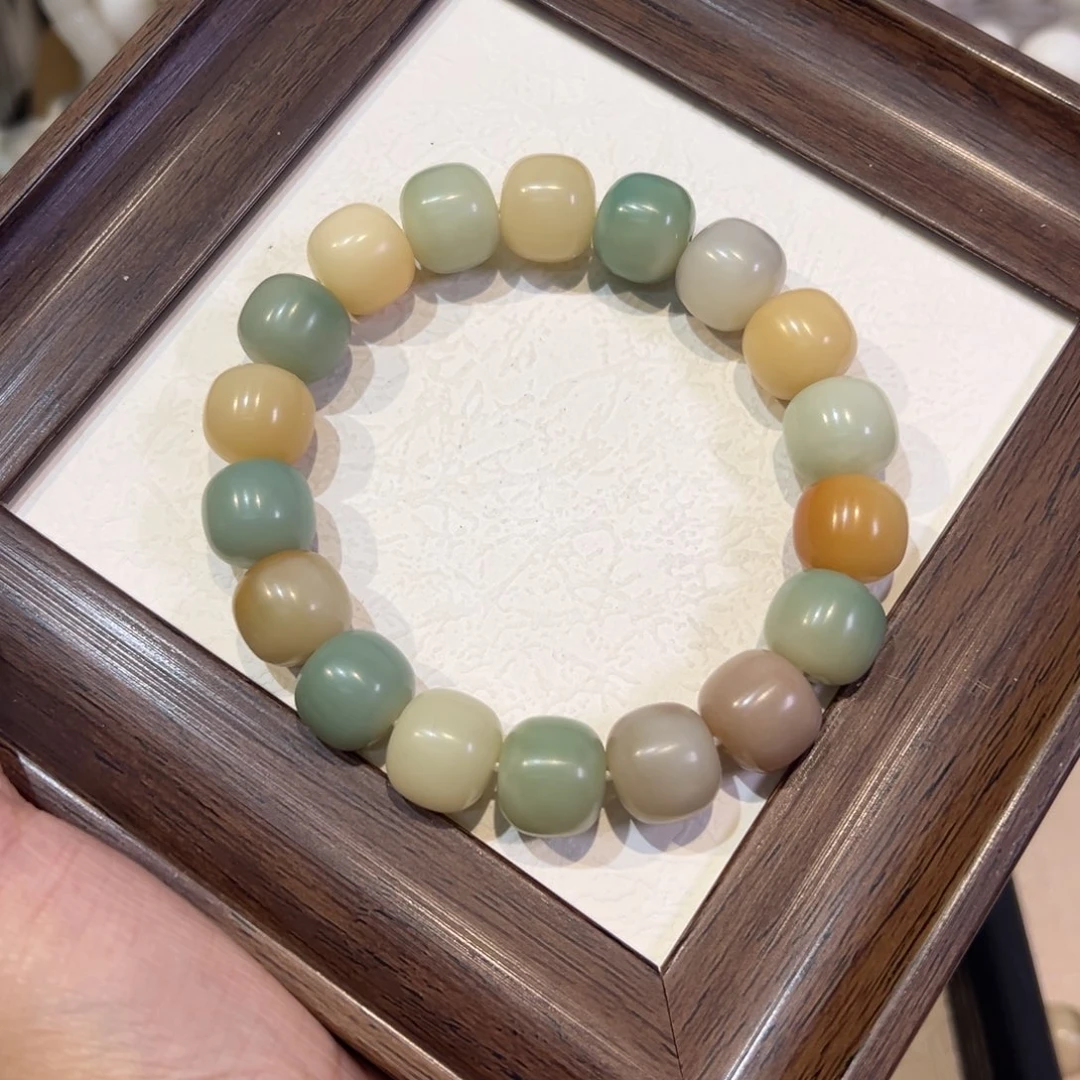 吊坠菩提根/象牙果棕青羽全卡14.5