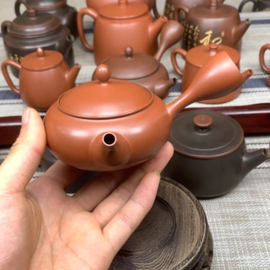 壶背*侧把壶 150多毫升 红色复烧的