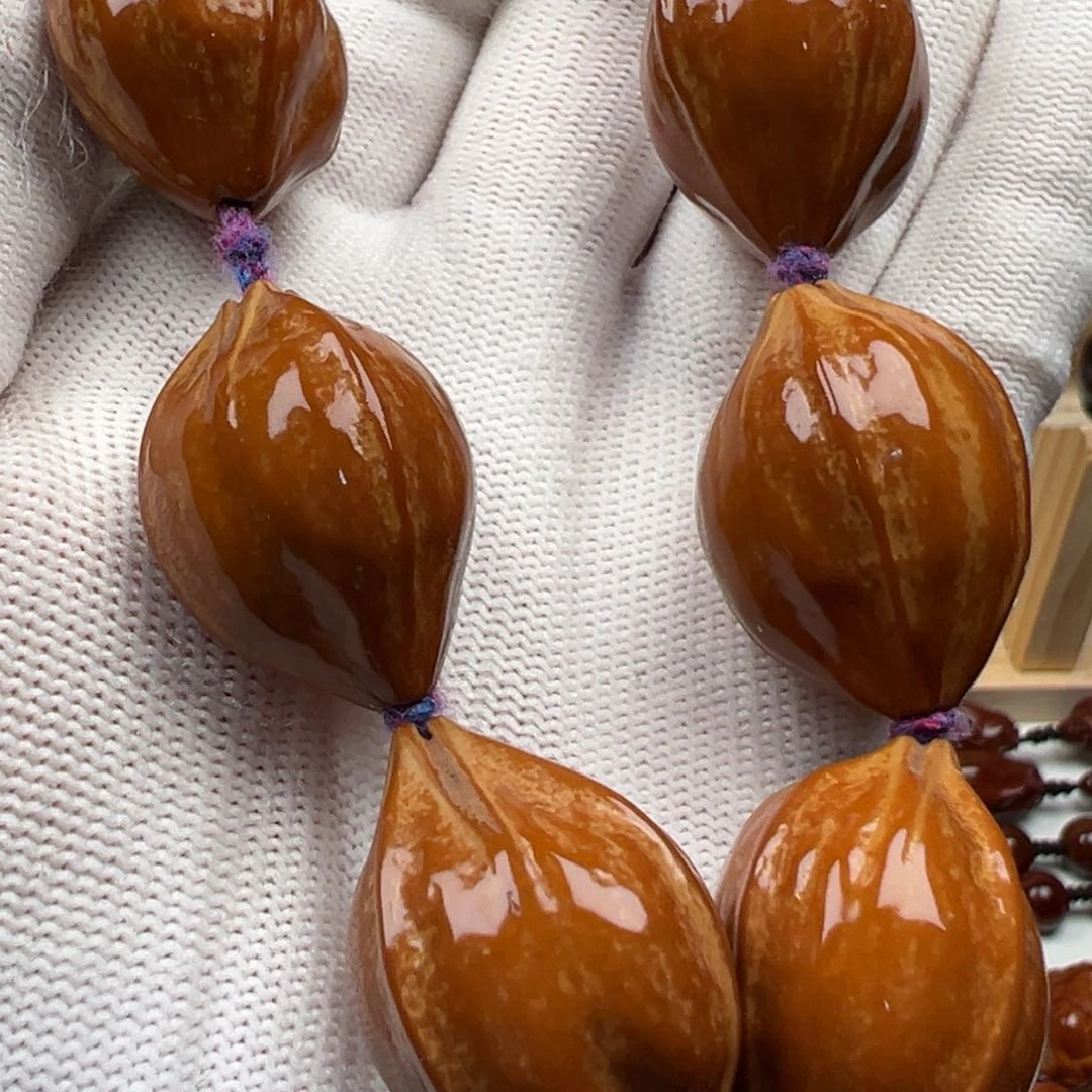 橄榄核吊坠今***兴橄榄核