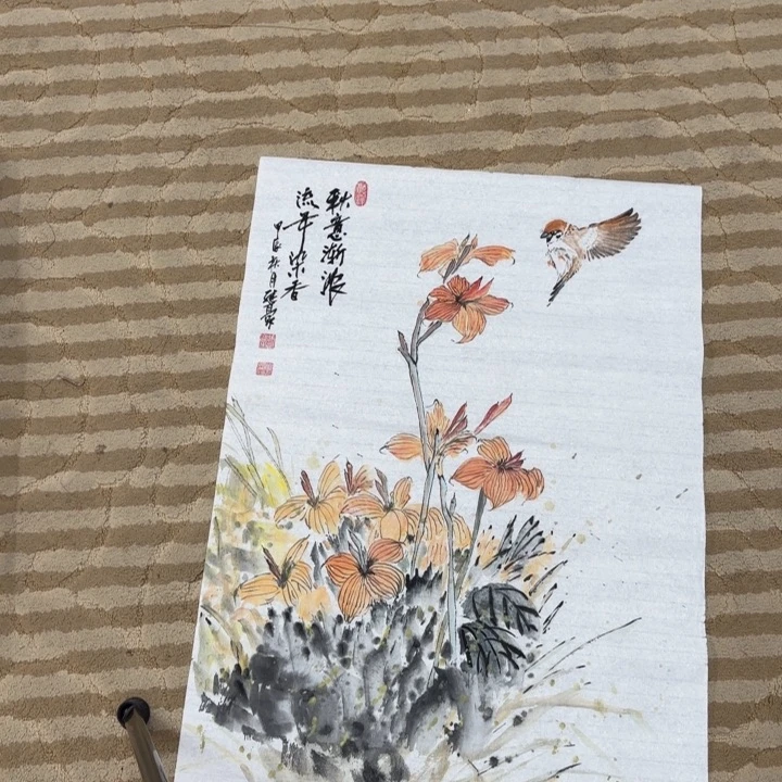 国画花鸟等图案为一体而得