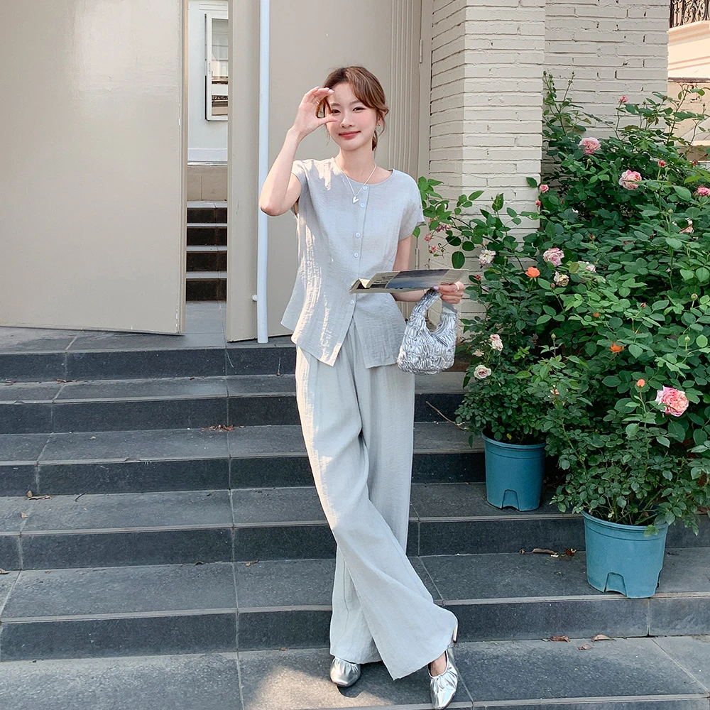 松弛感设计感单排扣上衣套装女2025夏季新款慵懒休闲阔腿裤两件套
