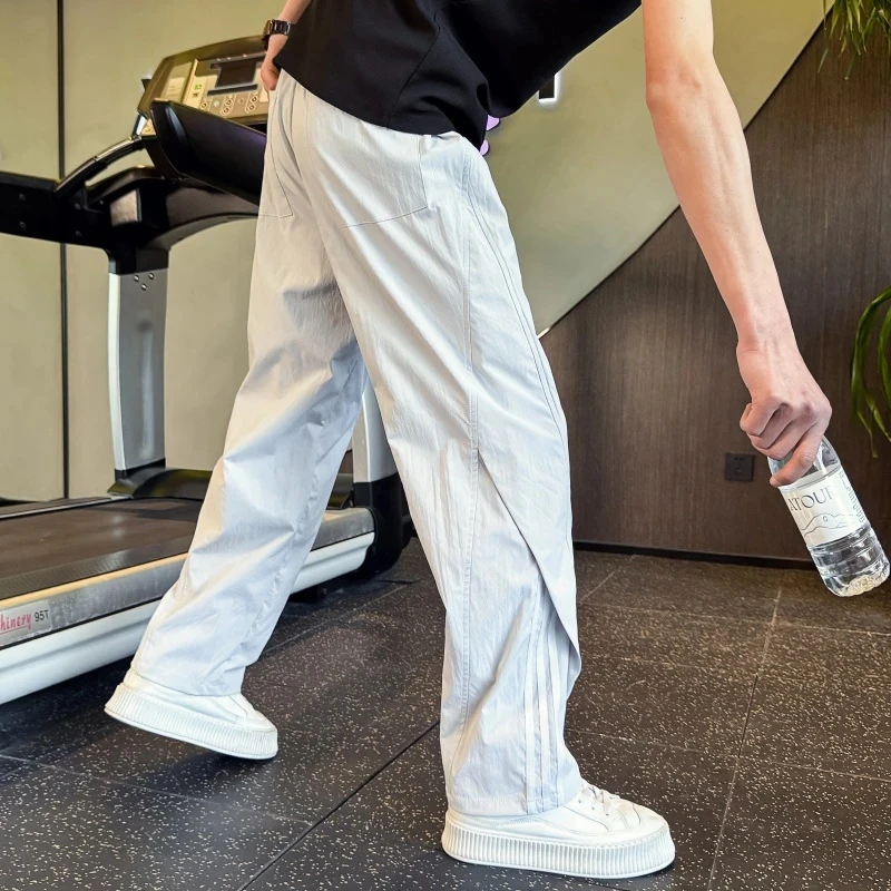 潮牌设计感条纹拼接休闲裤男夏季薄款透气速干裤2025新款直筒男裤