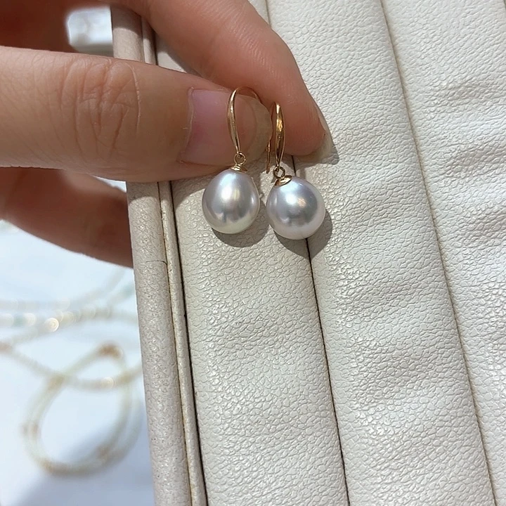 懒***躺18K金镶嵌海水珍珠耳饰