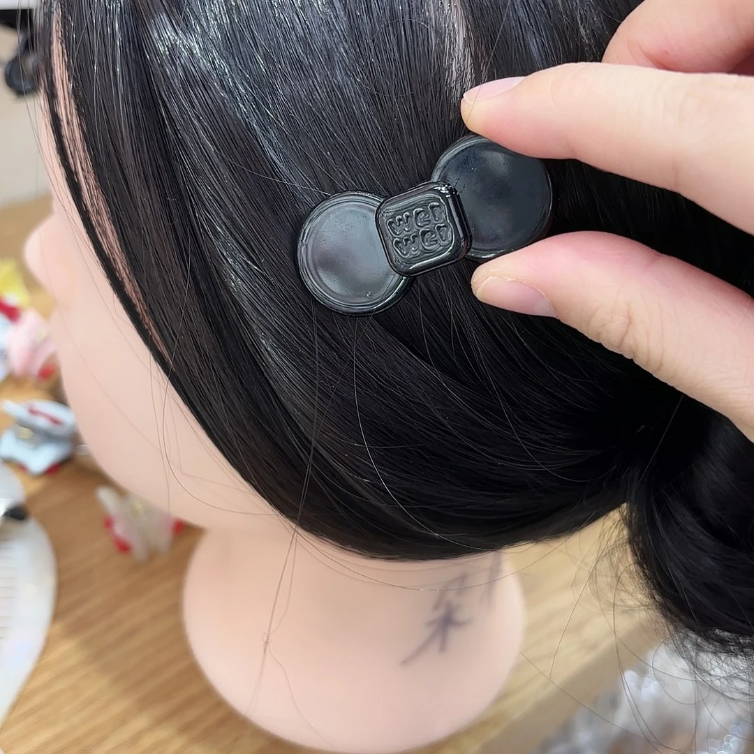 皮质铁合金小号黑色蝴蝶结