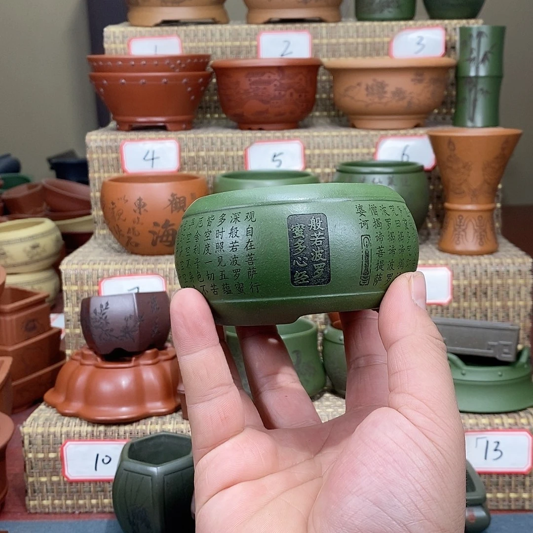 紫砂花盆看**买我在看书