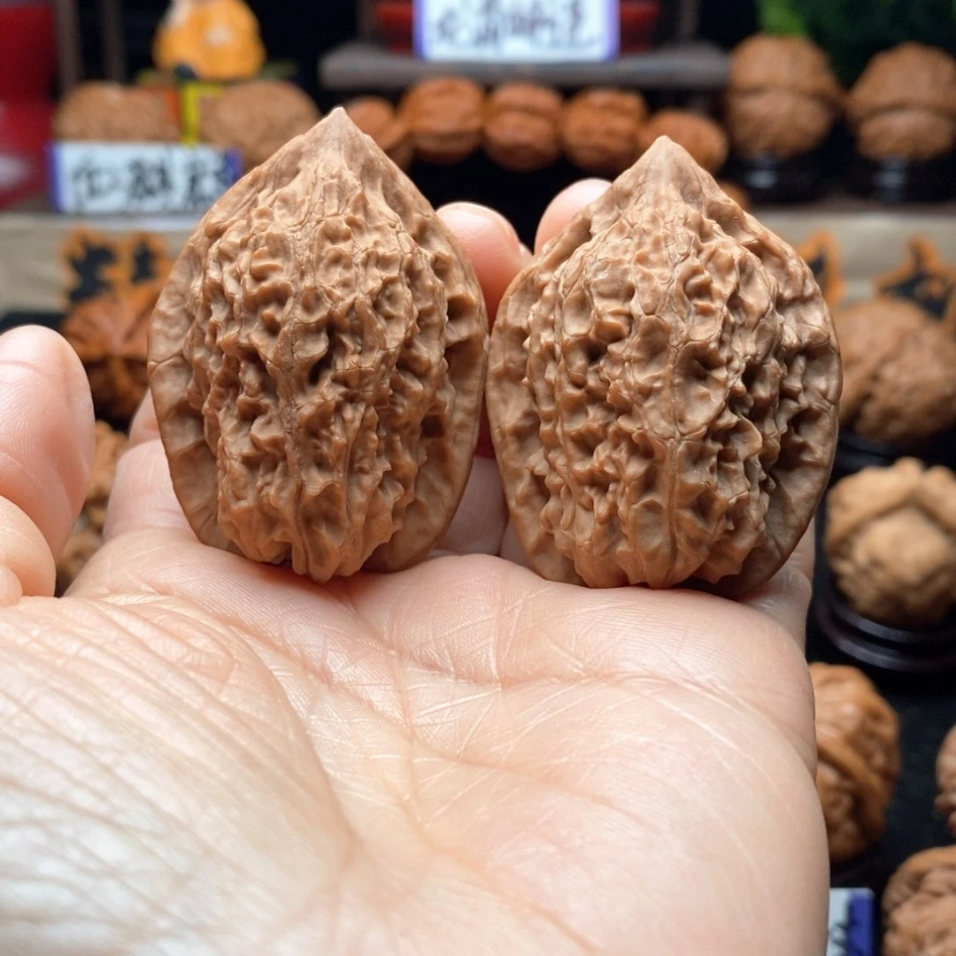 文玩核桃把件上古鸡心