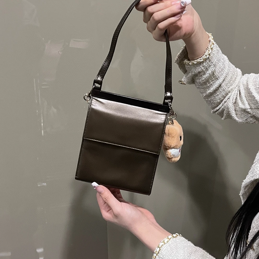 95新 GUCCI/古驰 gucci 珠光棕色手提斜挎包