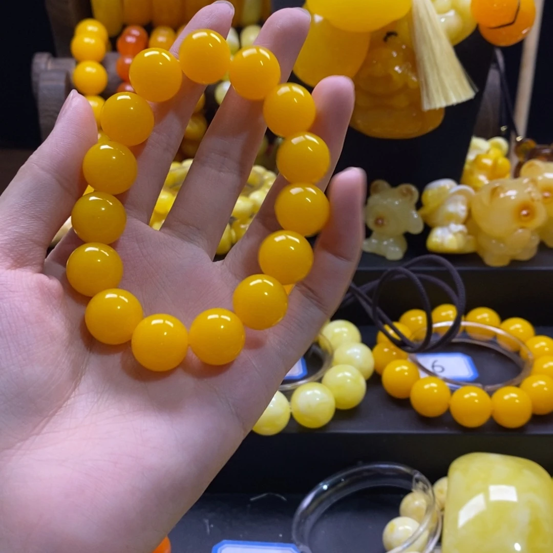 祁***月非金属全品无暇鸡油黄手串