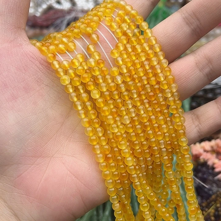 玛瑙/玉髓未镶嵌珠宝半成品一条4mm左右黄飘花