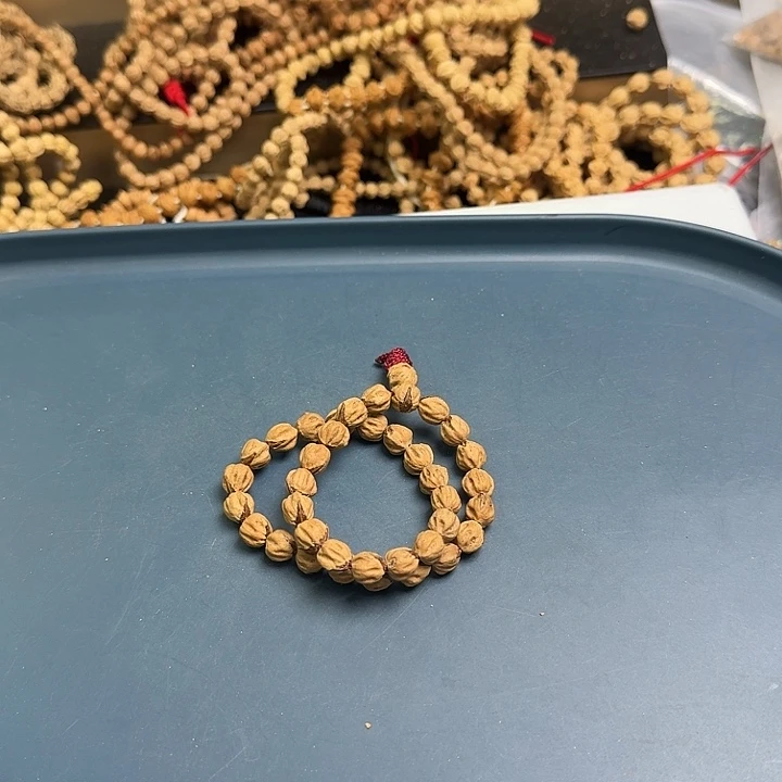 俄***一吊坠柏香籽/百香籽圆桩手持一个