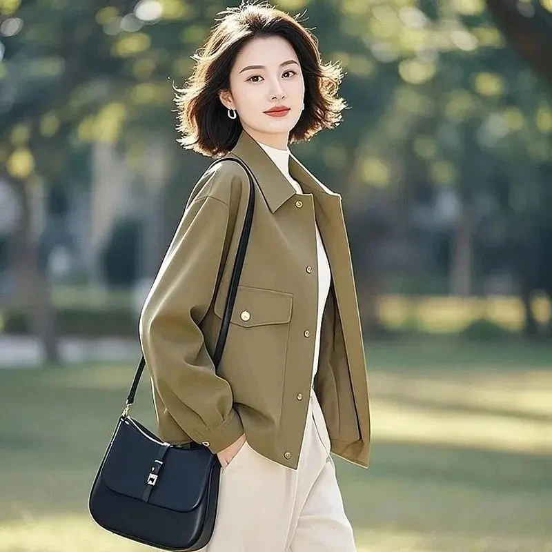 今年流行的新款独特绝美高级小众不撞款绿色外套女2025年新款春秋