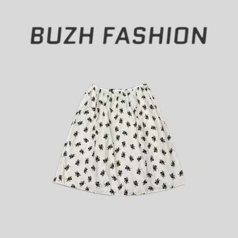 BUZH夏季新款设计感‘浪漫褶皱肌理’小碎花蕾丝花边下摆半身裙