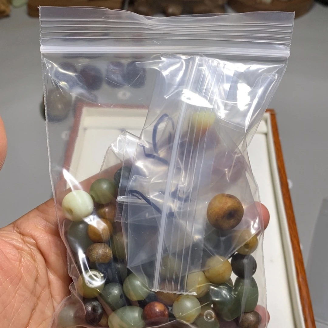 和田玉未镶嵌颈饰乐*