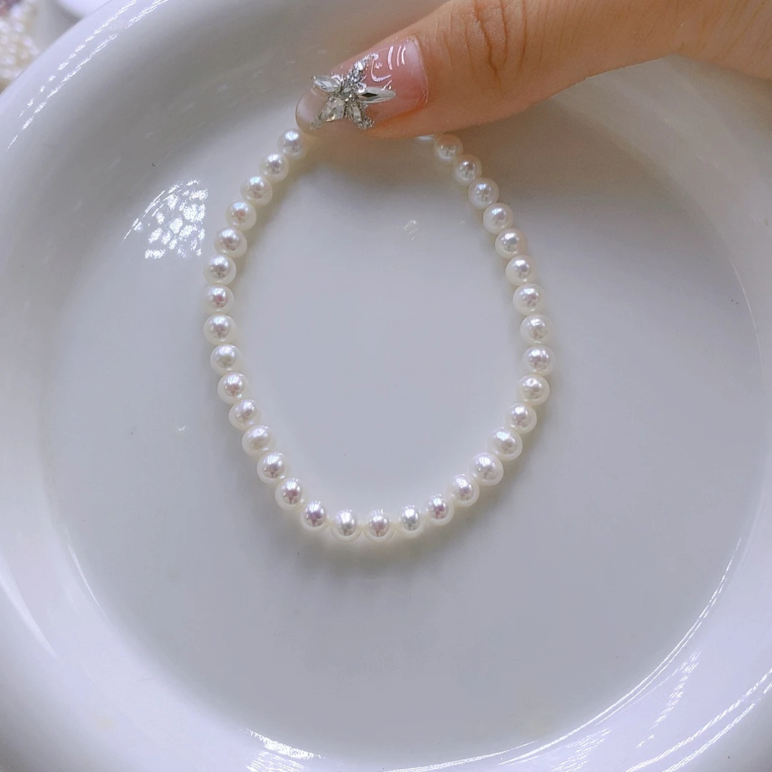 银S925镶嵌耳饰淡水珍珠乔