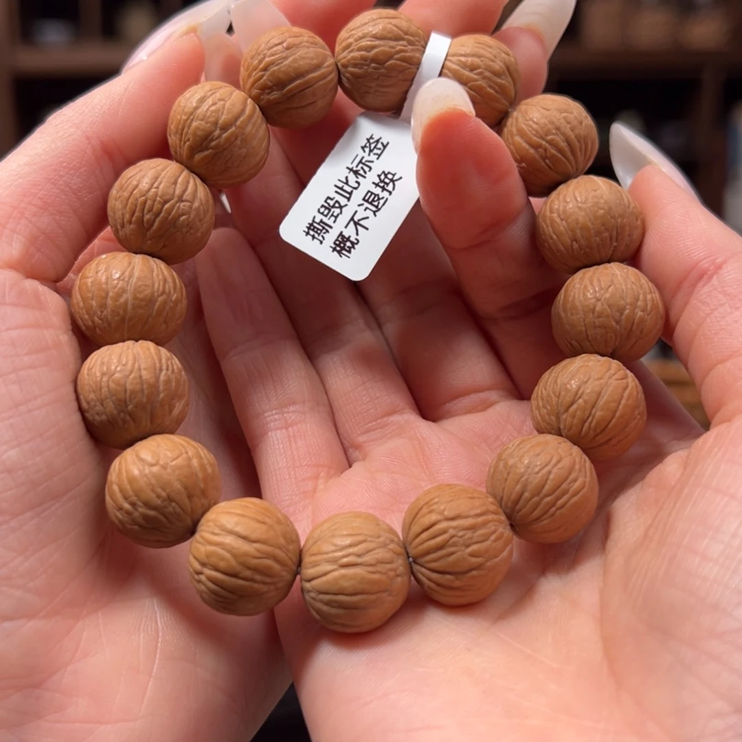 猴头核桃手串原皮凤羽