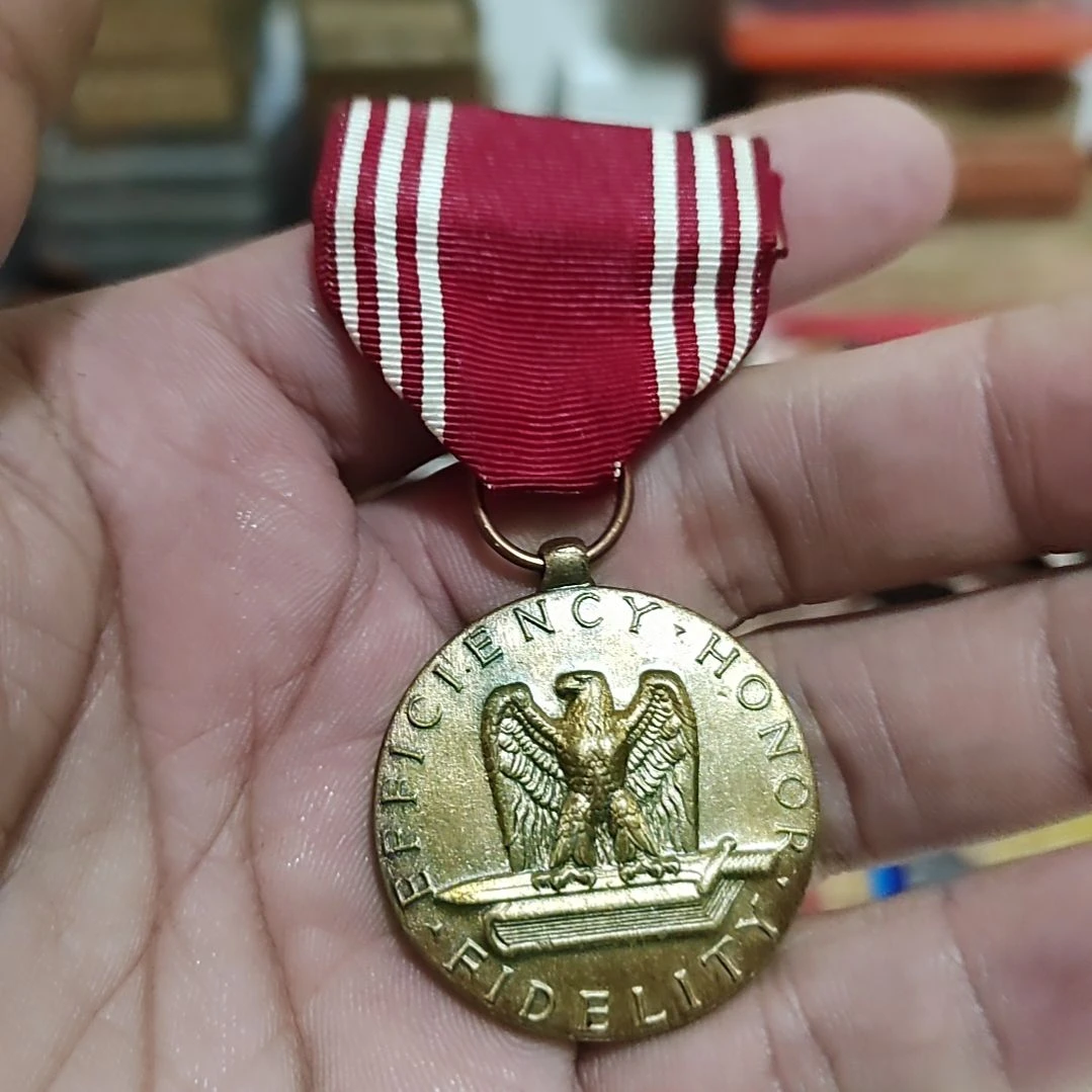 裘***君美国早期的纪念章一个