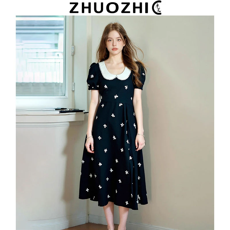 [卓芝]法式娃娃领绣花黑色连衣裙2025夏季新款收腰显瘦气质中长裙