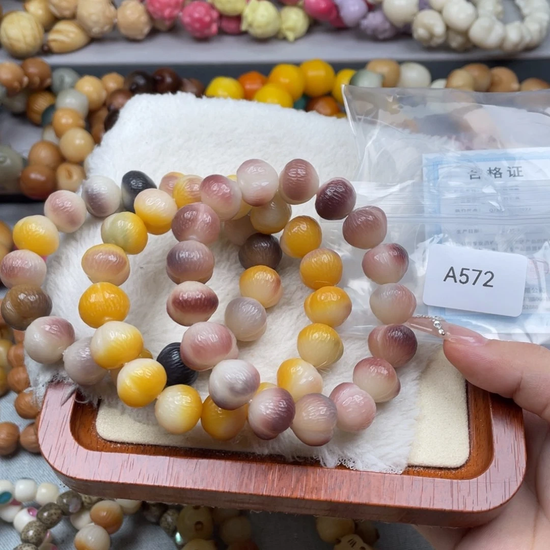 我***芦菩提根/象牙果手串瑕A572拉丝桃14mm一串
