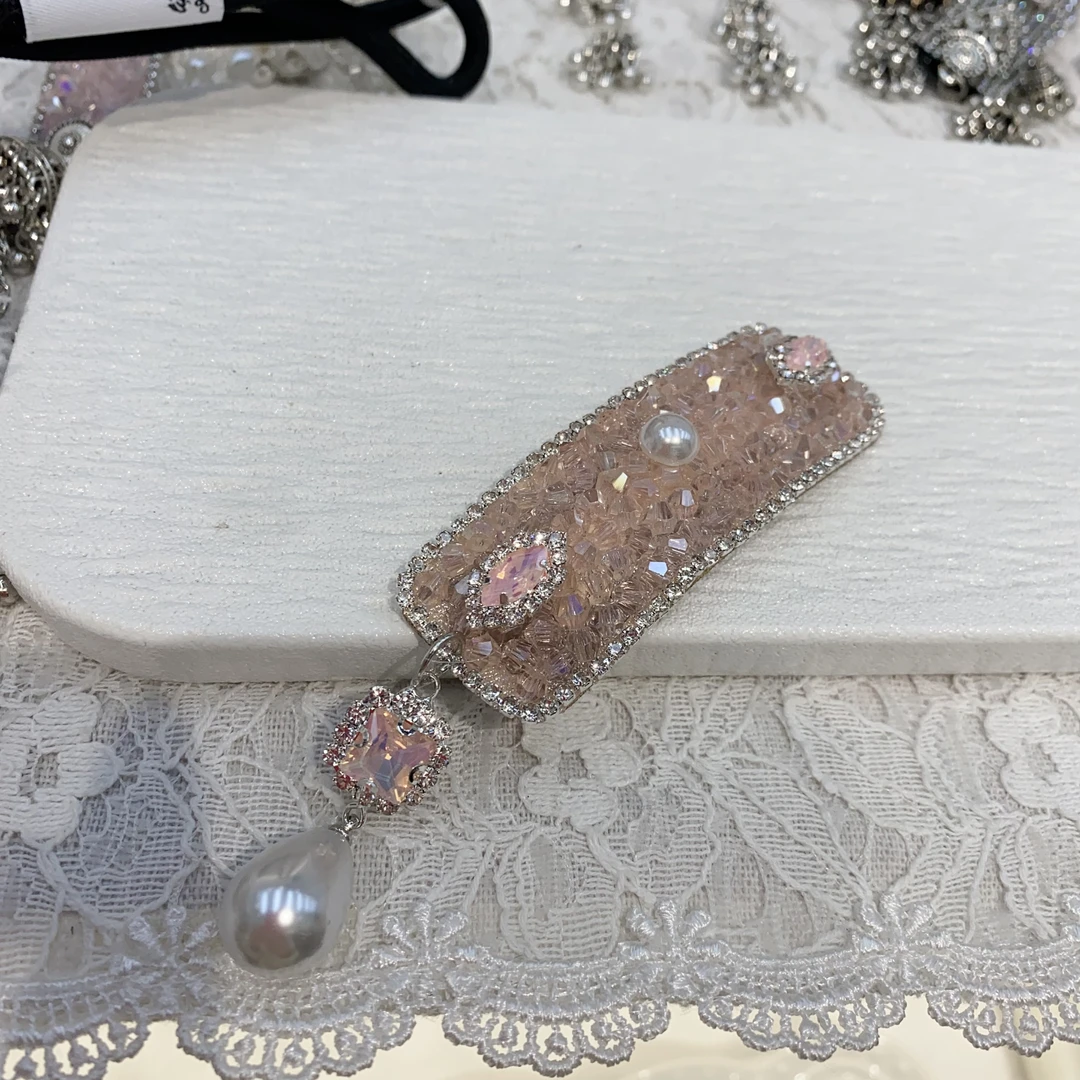 A257淡粉色水水流苏包掰掰夹