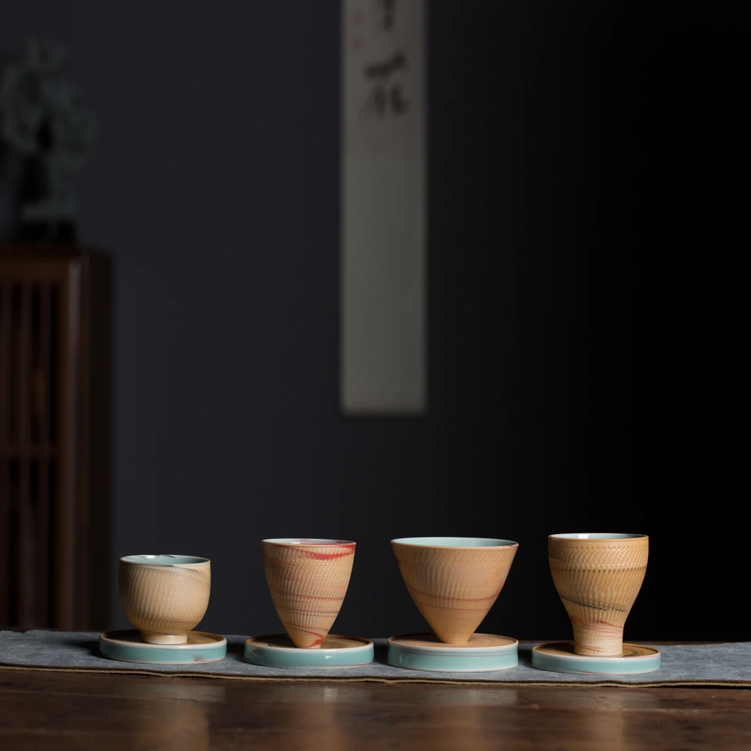 龙泉青瓷手工绞胎跳刀双釉主人杯4杯4垫套组陶瓷家用茶具喝茶杯