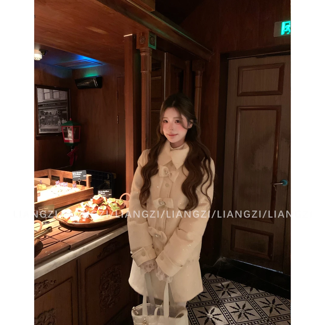 梁子【雪国精灵】冬季收腰A字半身裙/甜美风可拆卸蝴蝶结羽绒服