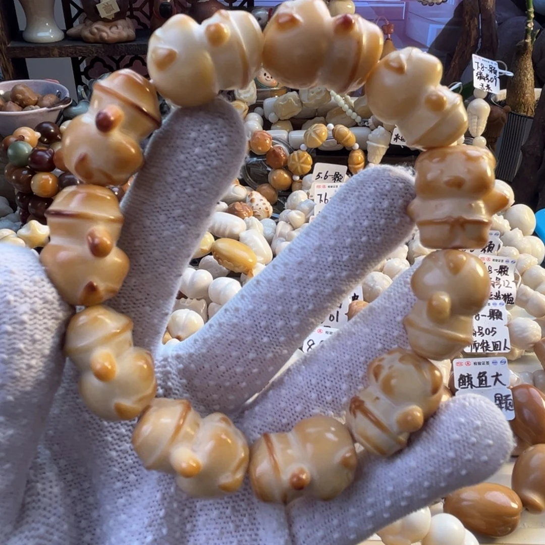 菩提根/象牙果手串-烤色眼镜猪