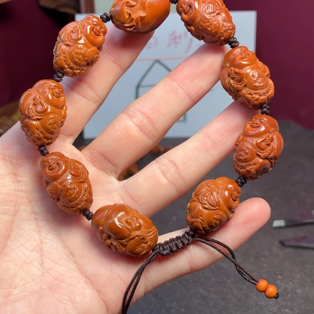 橄榄核手串红八宝弥勒