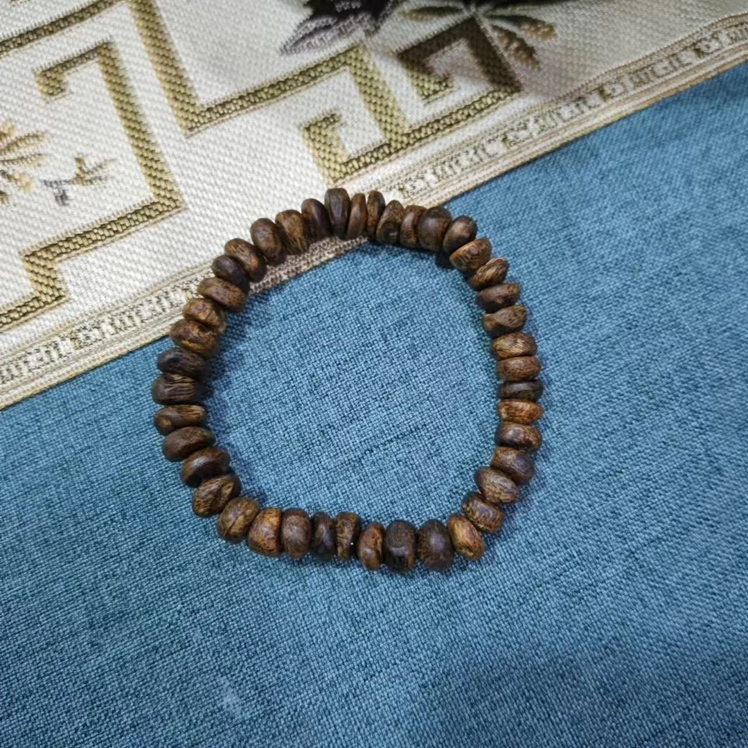 世间臻宝-越南黑棋留疤大树丁手串/多样性发/P6498