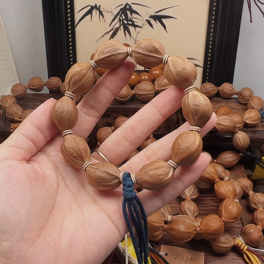 摸***挞手串橄榄核18.24梅林铁核