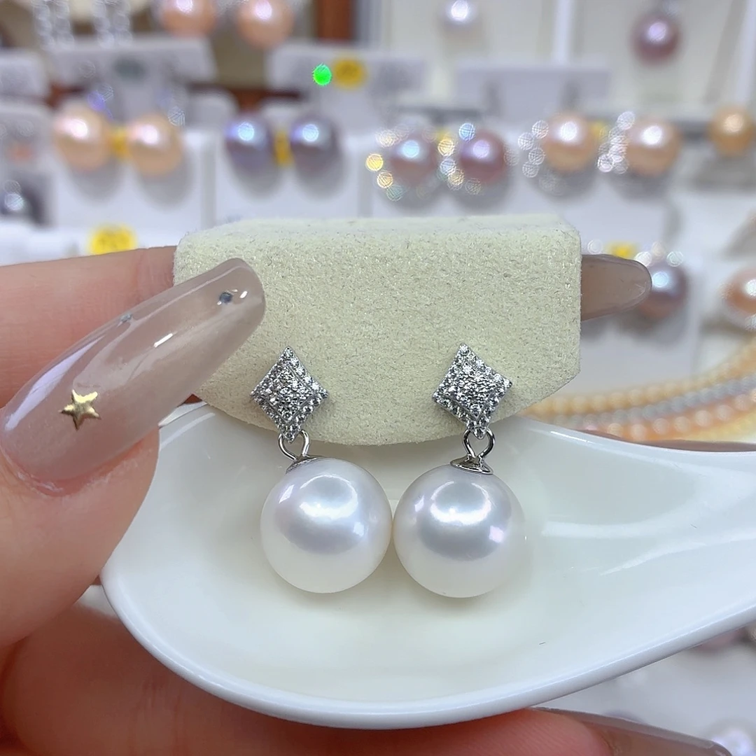 朱***兔淡水珍珠耳饰银S925镶嵌