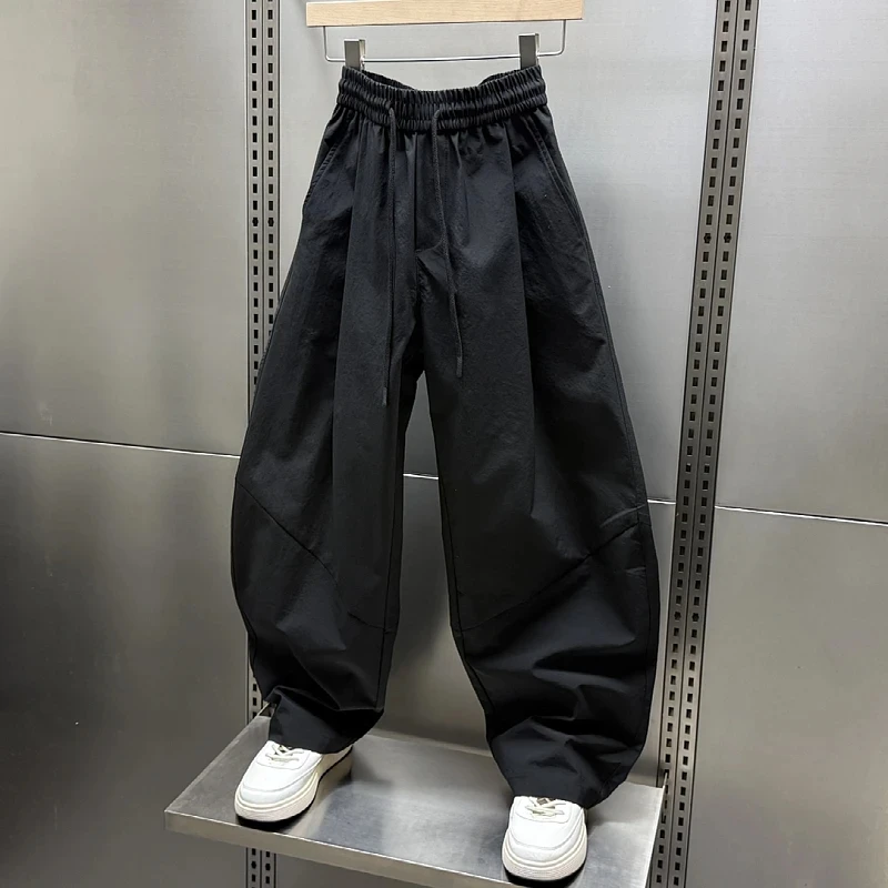 2025夏季纯色大码轻薄运动休闲卫裤男生抽绳松紧腰阔脚哈伦弯刀裤