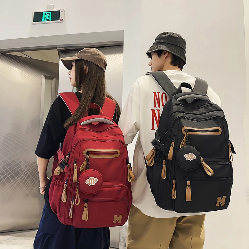 书包男初中生简约小学生高中生女大容量减负护脊轻便大学生双肩包