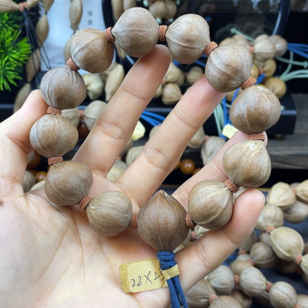 ꧔****橄榄核吊坠22X23老料红核