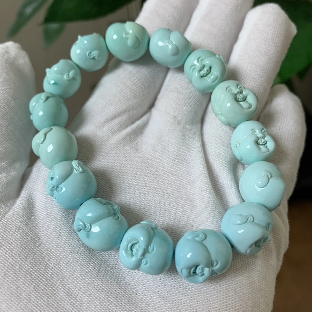 天然原矿绿松石笑脸佛头