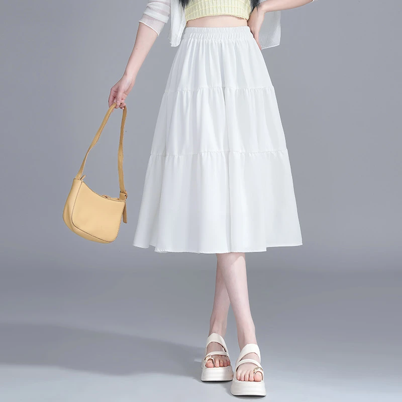 拉夏贝尔白色蓬蓬半身裙女夏季2025新款中长款大摆蛋糕裙a字伞裙