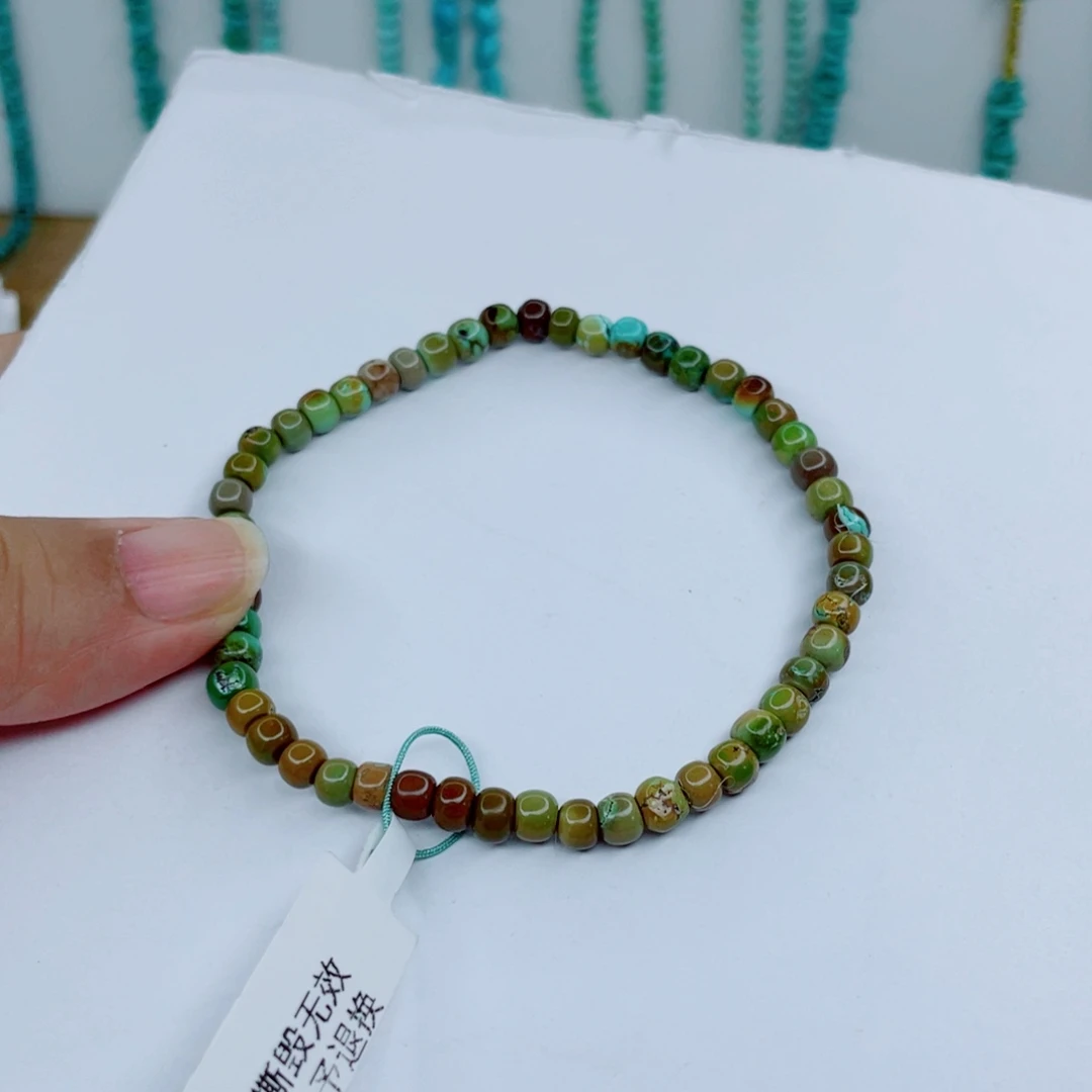 绿松石未镶嵌颈饰珊**