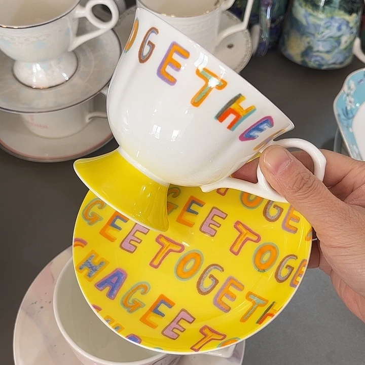 瓷片瑕疵字母杯碟一套瑕疵