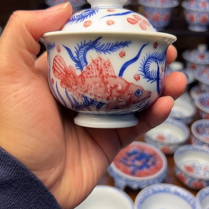 青花釉里红红鱼布袋盖碗
