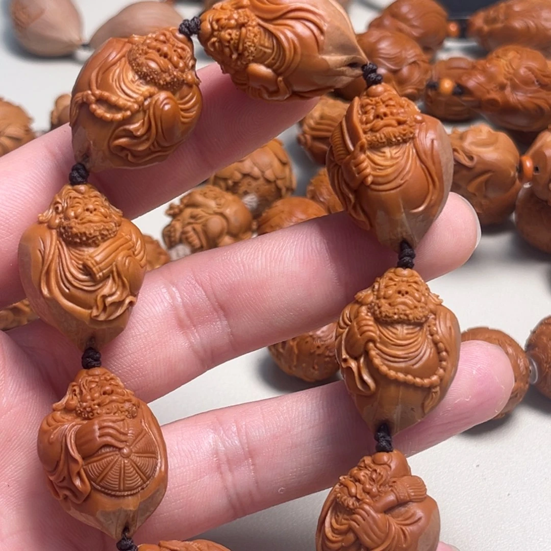 橄榄核吊坠小*包衣达摩