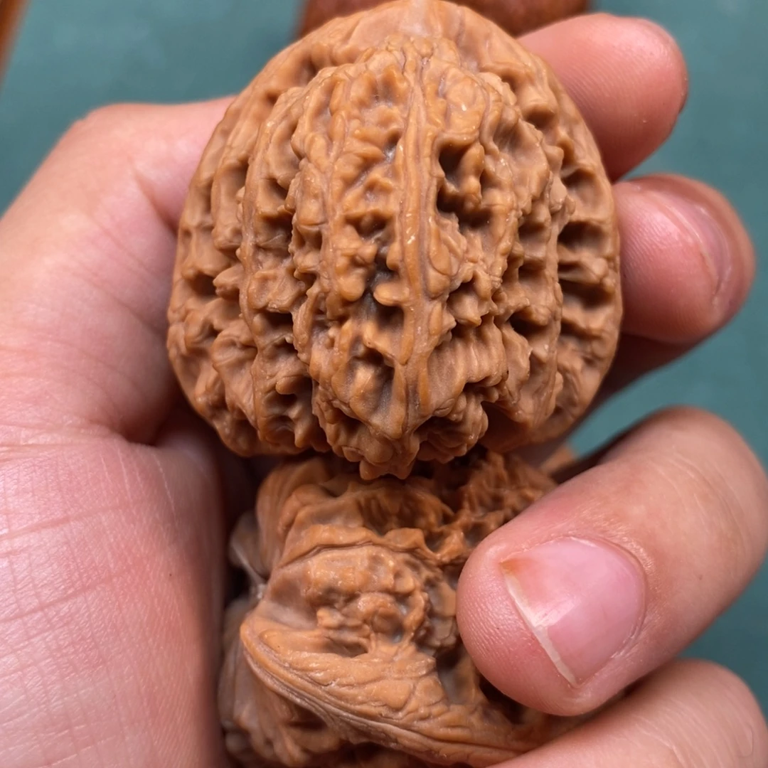 吊坠桃核卍字歪疆
