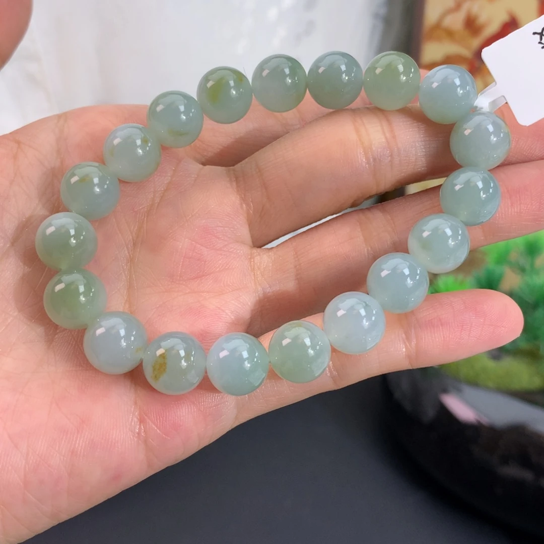翡翠未镶嵌手串卡9.8胶润蓝底飘黄翡手串