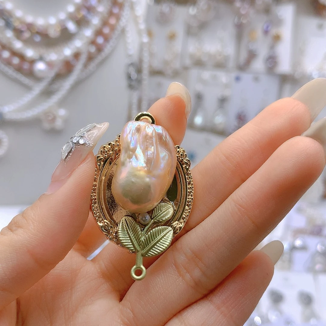 银S925镶嵌耳饰淡水珍珠狸*?