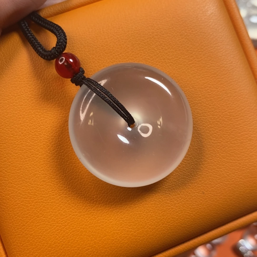 杨***.石英质玉未镶嵌颈饰扣子