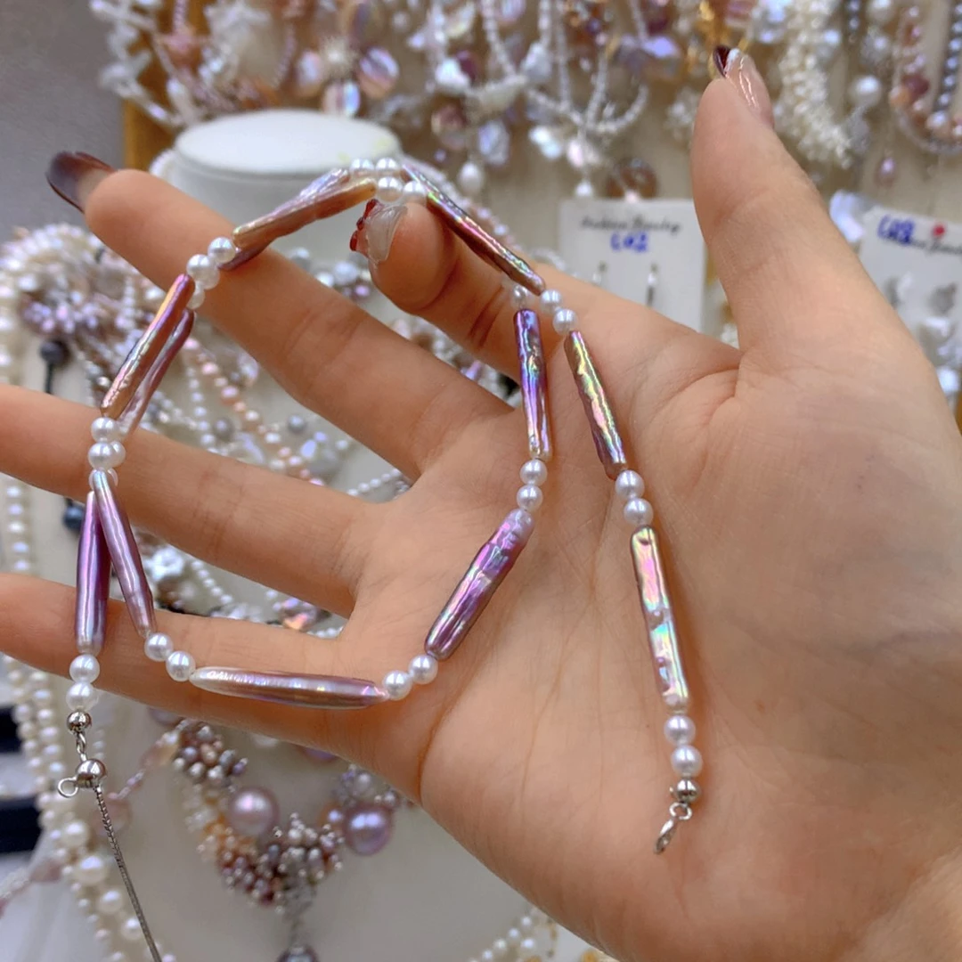 淡水珍珠耳饰银S925镶嵌红***阳