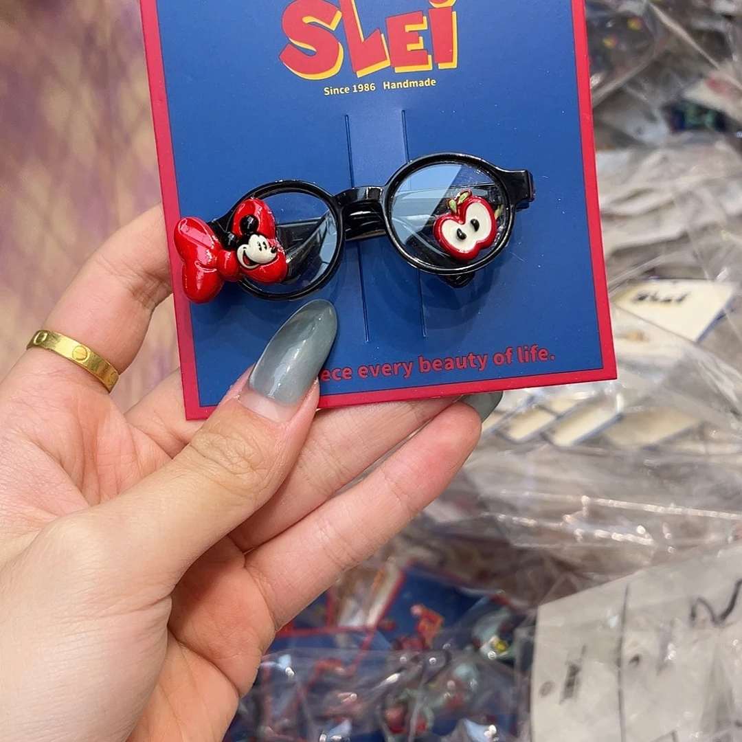 布艺非金属黑色小眼睛米奇红蝴蝶结