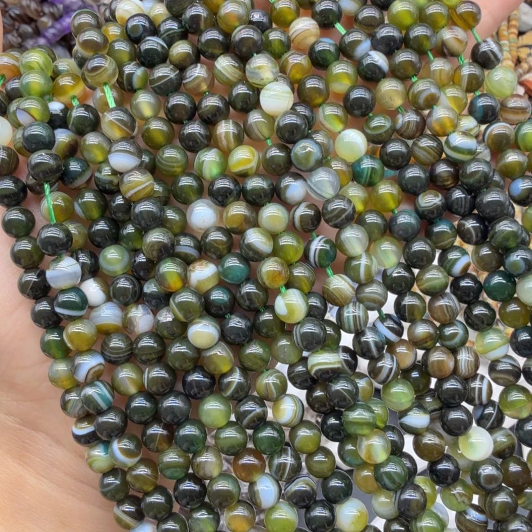 水晶珠宝半成品未镶嵌卡6黄绿缠丝一条