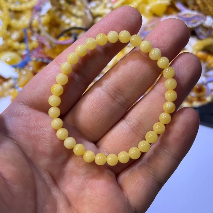 江***歌未镶嵌琥珀裸石蜜蜡单圈5.7m3.5克