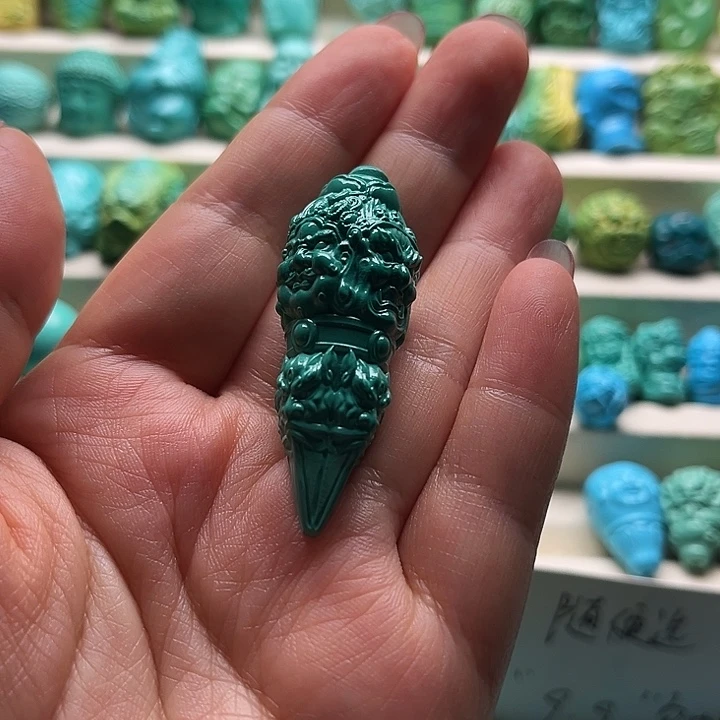 敖***生精工雕刻降魔杵绿